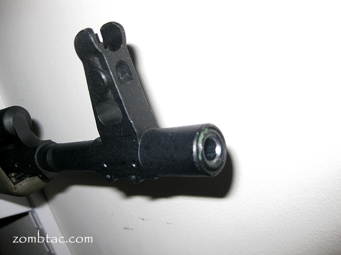 AK-47 gas block retains a cleaning rod and mounts a bayonet (top) and AK-74...
